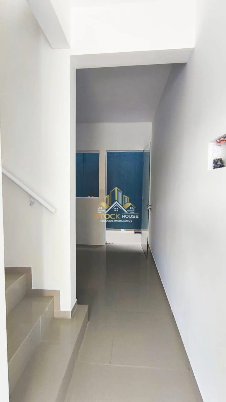 Sobrado geminado na praia