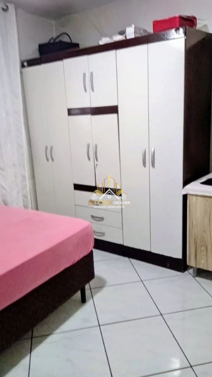 TERRENO COM DUAS CASAS À VENDA