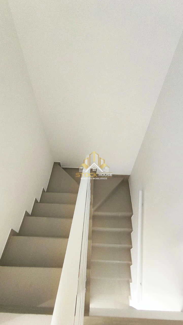 Sobrado geminado na praia