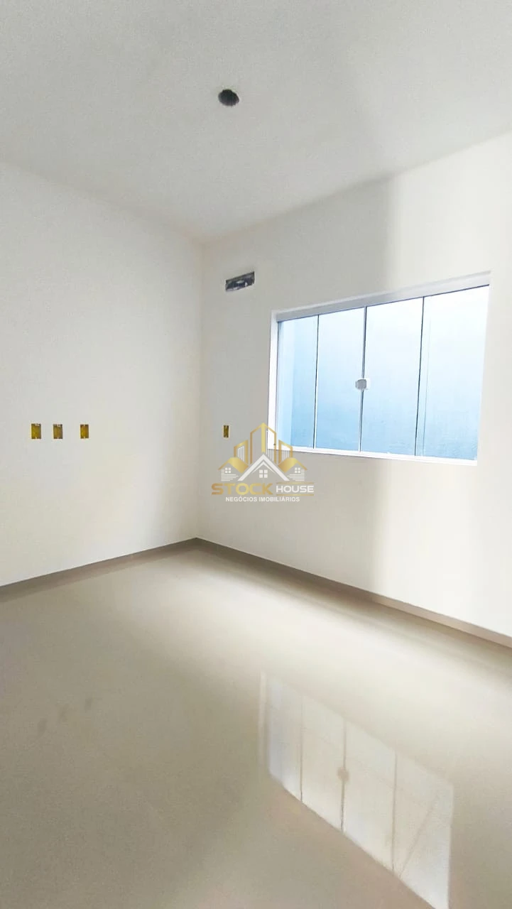 Sobrado geminado na praia