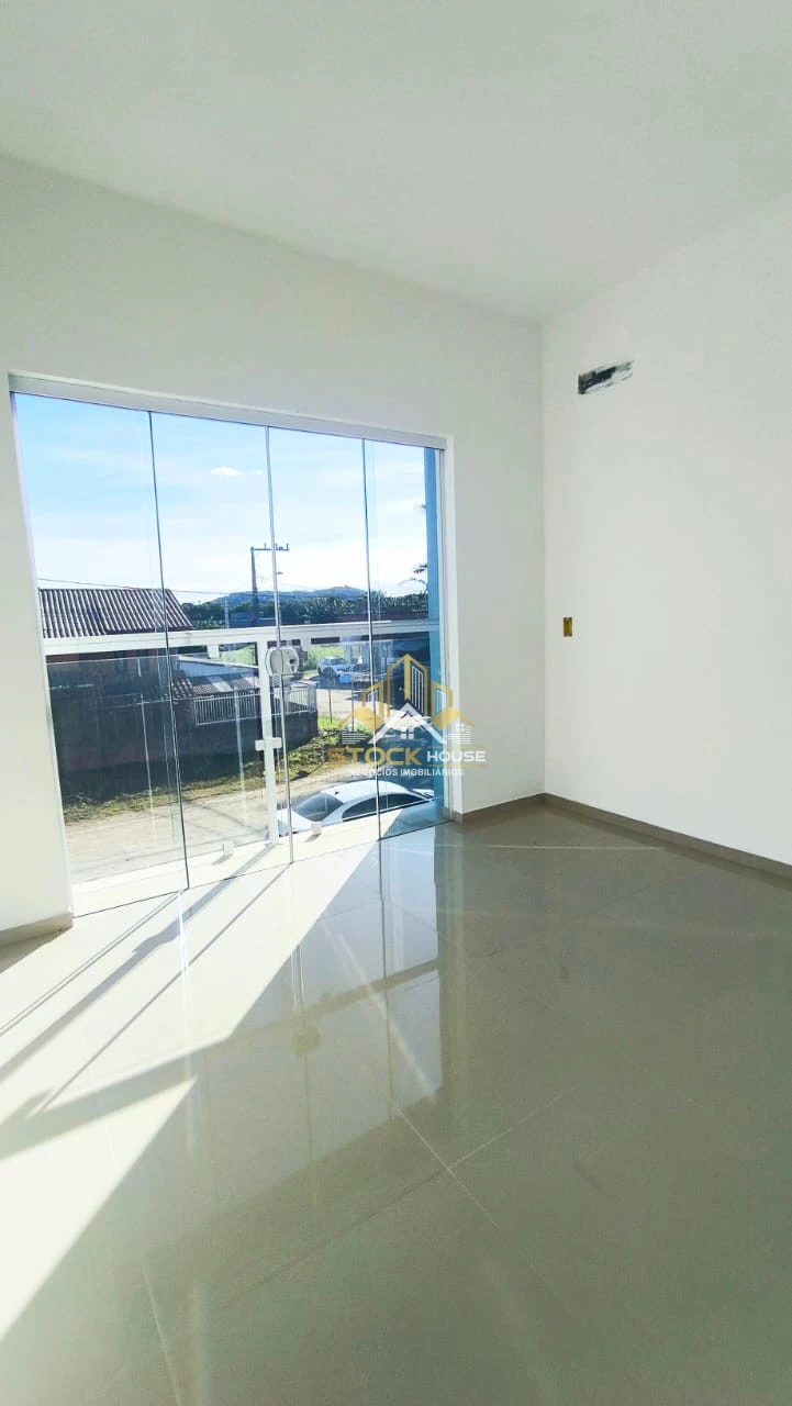 Sobrado geminado na praia