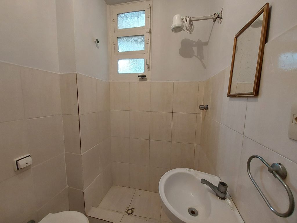 Imagens do imóveis Amplo sala quarto no centro