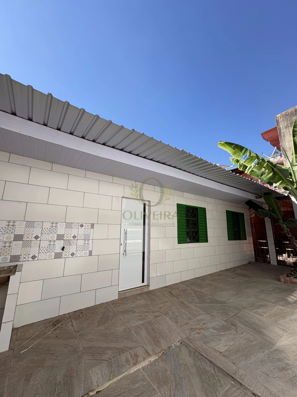 CASA DOIS DORMITÓRIOS COM GARAGEM