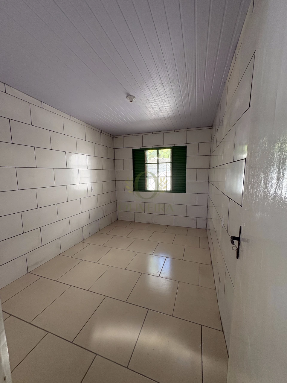 CASA DOIS DORMITÓRIOS COM GARAGEM